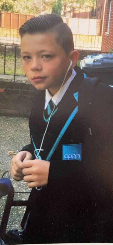 James in school uniform